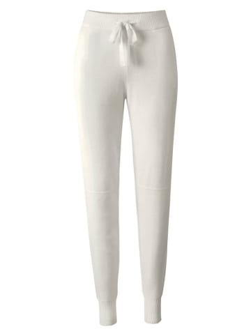 Heine Spodnie dresowe w kolorze kremowym