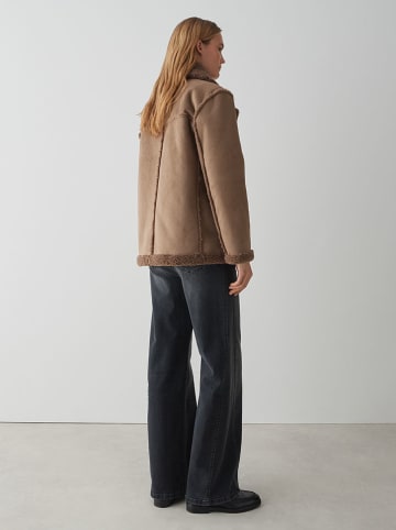 OPUS Omkeerbare teddyjas bruin