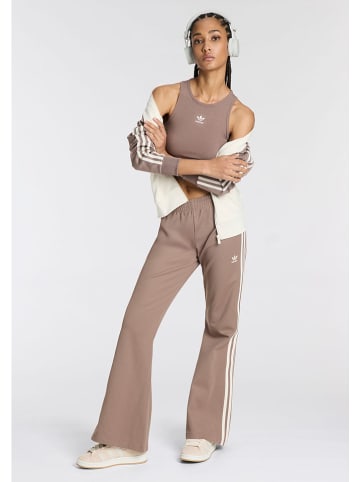 adidas Spodnie dresowe w kolorze beżowym