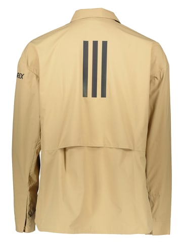 adidas Kurtka funkcyjna w kolorze beżowym