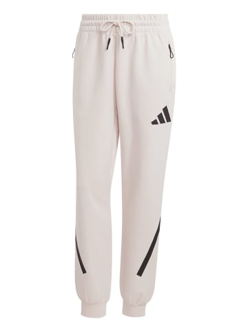 adidas Spodnie dresowe "Z.N.E." w kolorze kremowym