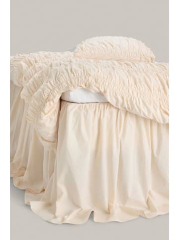 Ellos Home Falbana "Loosed" w kolorze kremowym na łóżko