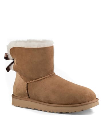 UGG Lammfell-Winterboots "Mini Bailey Bow II" in Camel