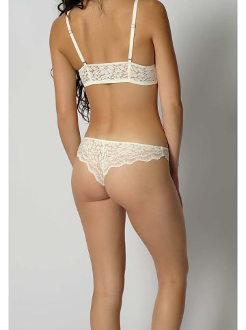 Skiny Stringi w kolorze kremowym