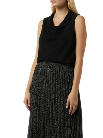 comma Top in Schwarz