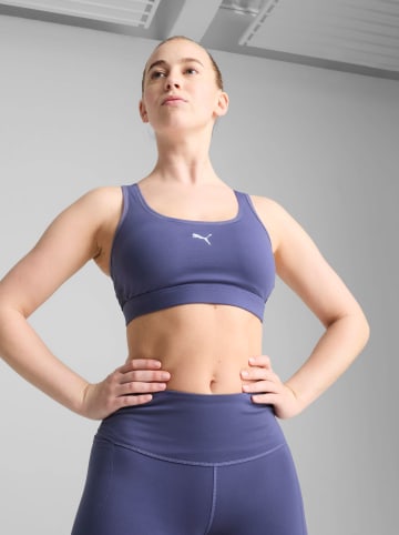 Puma Biustonosz sportowy "4Keeps" w kolorze fioletowym