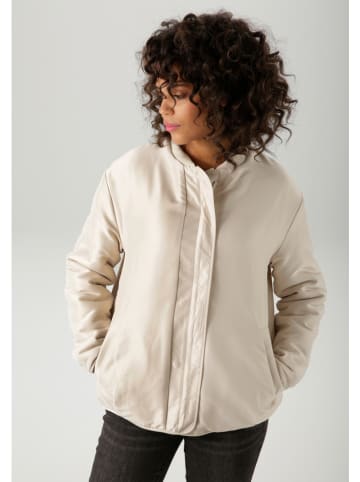 Aniston Tusssenjas zandkleurig