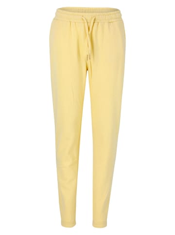 Endurance Spodnie dresowe "Bastini" w kolorze żółtym