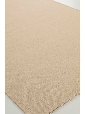 Jotex Wełniany dywan "Row" w kolorze kremowym
