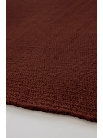 Jotex Wełniany dywan "Row" w kolorze czerwonym