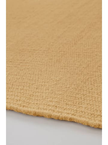 Jotex Wełniany dywan "Row" w kolorze żółtym