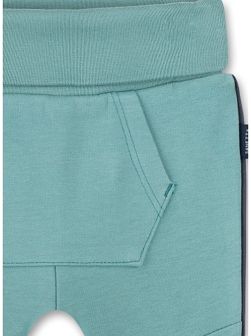Sanetta Kidswear Spodnie dresowe w kolorze turkusowym