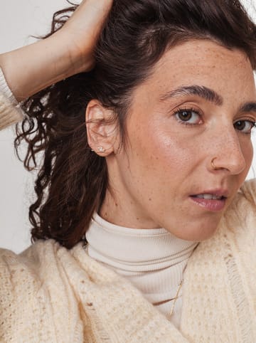 Ania Kruk Vergold. Piercing mit Edelsteinen