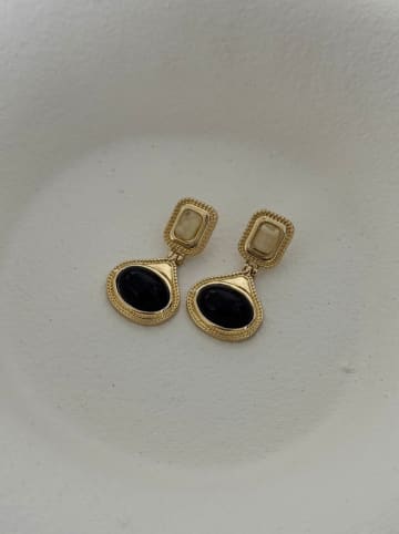 Heliophilia Vergulde oorstekers