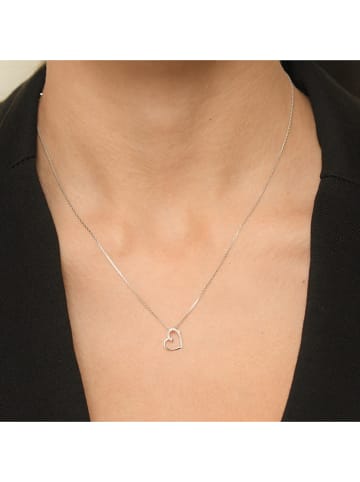 CARATELLI Złota zawieszka "Coeur Précieux" z diamentami