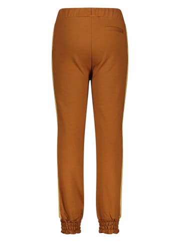 Like Flo Spodnie dresowe "Like Flo Flo" w kolorze jasnobrązowym