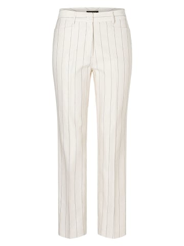 More & More Spodnie w kolorze kremowym