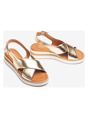 Unisa Leren sleehaksandalen goudkleurig