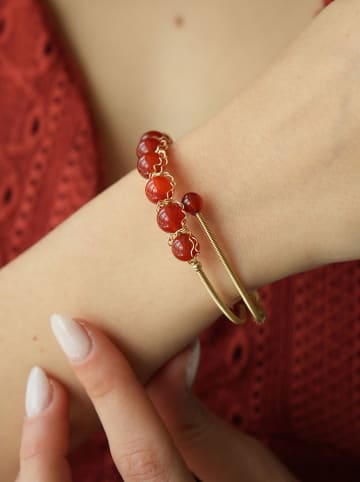 Pierres de Jade Vergold. Armspange mit Edelsteinen