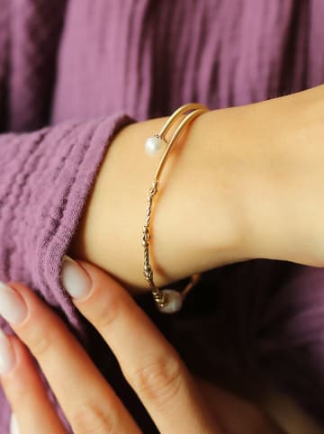 Pierres de Jade Vergold. Armspange mit Perlen