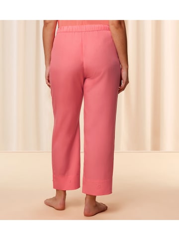 Triumph Spodnie piżamowe w kolorze łososiowym