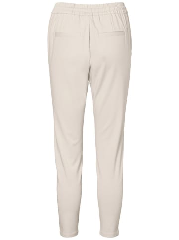 Vero Moda Spodnie "Eva" w kolorze kremowym