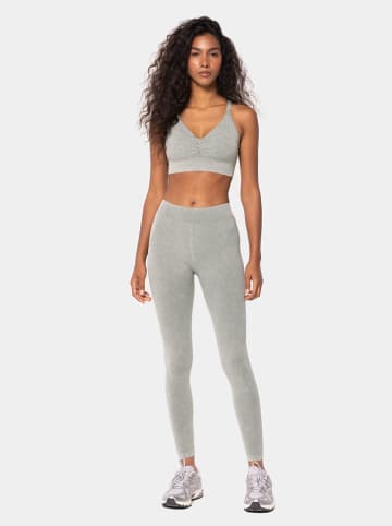 Carpatree Legginsy sportowe "Marble Story" w kolorze szarozielonym