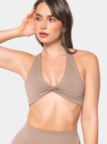 Carpatree Biustonosz sportowy "Accolade" w kolorze beżowym