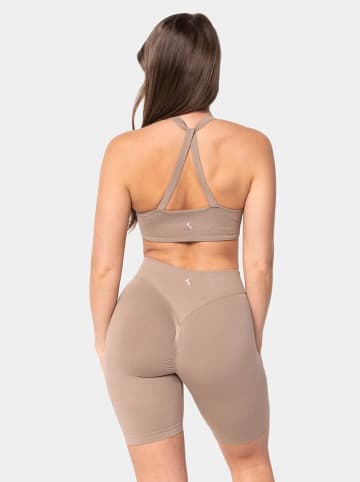 Carpatree Biustonosz sportowy "Accolade" w kolorze beżowym