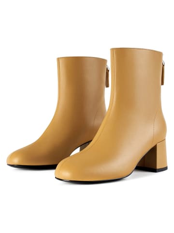 loft37 Skórzane botki w kolorze żółtym