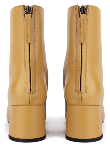 loft37 Skórzane botki w kolorze żółtym