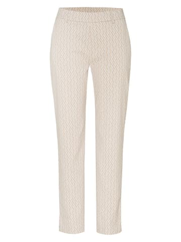 Toni Spodnie materiałowe w kolorze kremowym