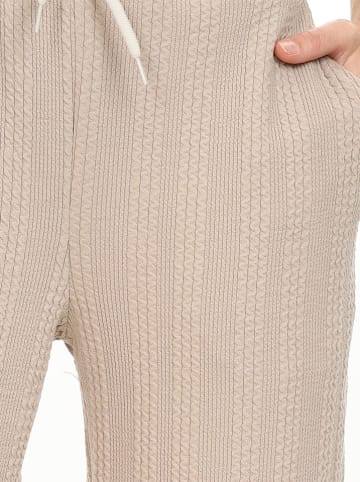 Denokids Spodnie dresowe w kolorze beżowym