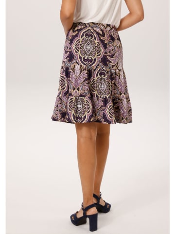 Aniston Rock in Schwarz/ Lila