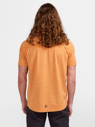 Craft Koszulka kolarska "ADV Gravel" w kolorze pomarańczowym