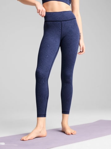 Puma Legginsy sportowe "Move Cloudspun" w kolorze fioletowym