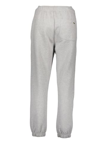 Lacoste Spodnie dresowe w kolorze jasnoszarym