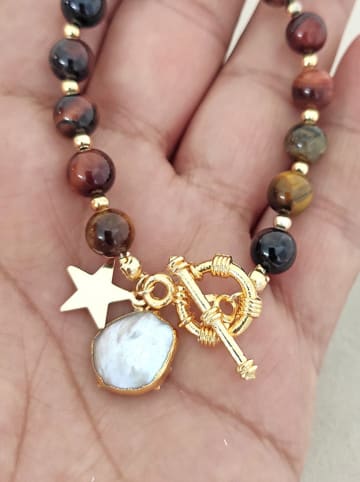 Nakkash Vergold. Armband mit Edelsteinen und Perle