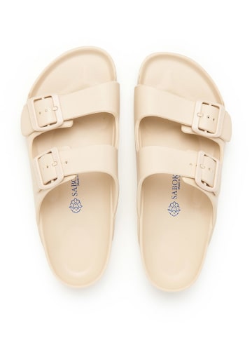 SABOKETS Klapki w kolorze beżowym