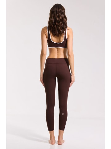 Onamaste Legginsy sportowe "Flow" w kolorze brązowym