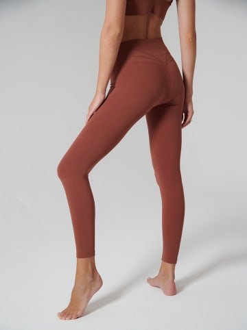 Onamaste Legginsy sportowe "Suzanna" w kolorze czerwonobrązowym