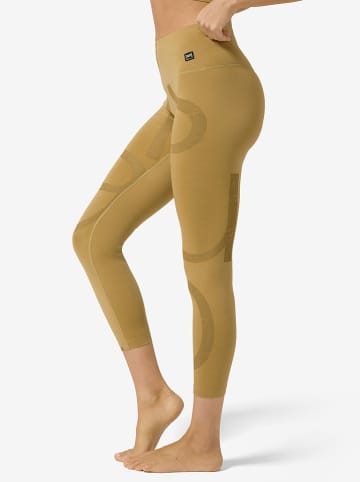 super.natural Trainingsleggings "Capital Logo" in Ocker