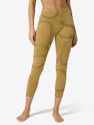 super.natural Trainingsleggings "Capital Logo" in Ocker