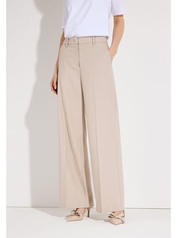 More & More Spodnie w kolorze beżowym