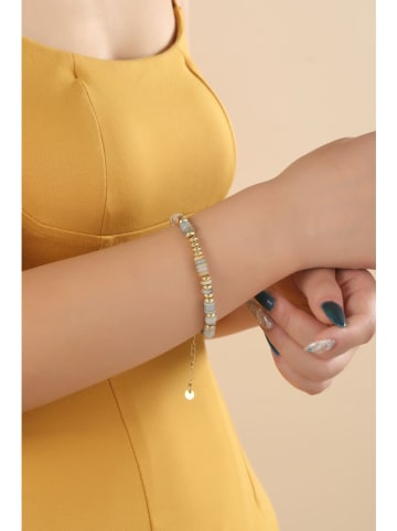 atelier MIU Vergold. Armkette mit Schmuckelementen