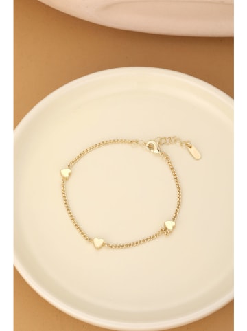 atelier MIU Vergold. Armkette mit Schmuckelementen