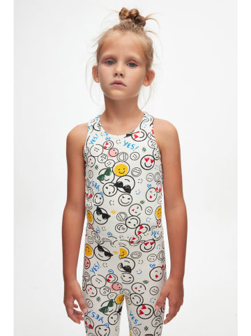 lovetti Legginsy w kolorze kremowym ze wzorem