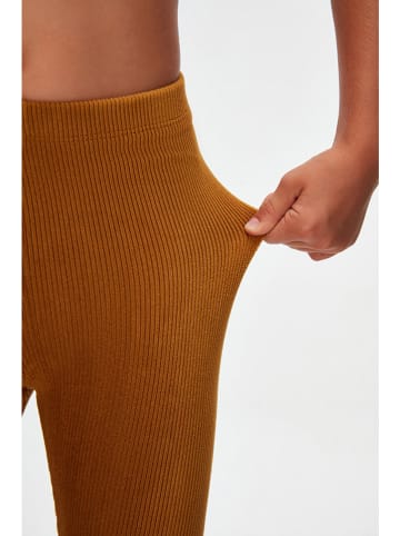 lovetti Legginsy w kolorze musztardowym