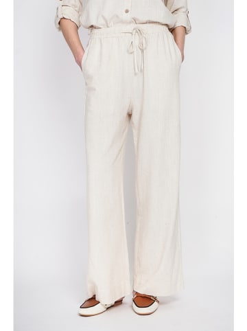 ASSUILI Lniane spodnie w kolorze kremowym