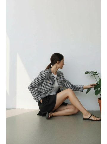 ASSUILI Tusssenjas zwart